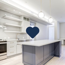 kitchen with ample counter-space, modern appliances and bright lighting